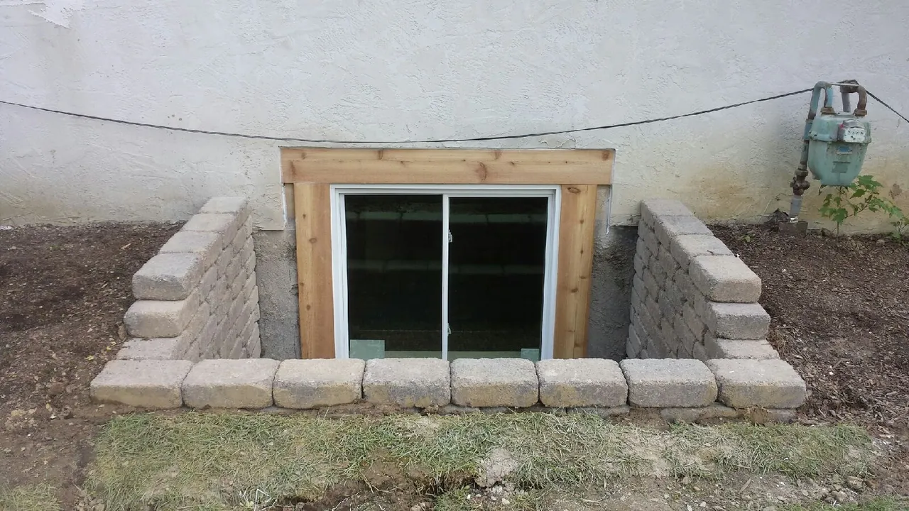 Example of exterior stucco alteration for egress window install