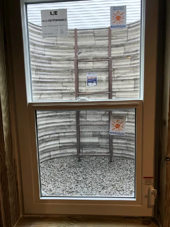 StoneView corrugated steel egress window well with hanging ladder