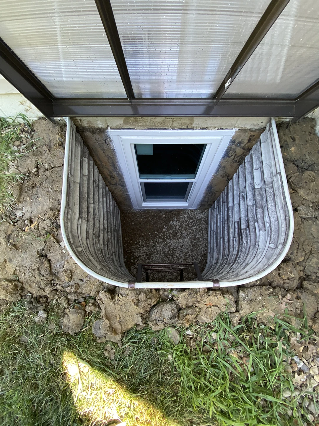 Stone View Egress Well with Ladder