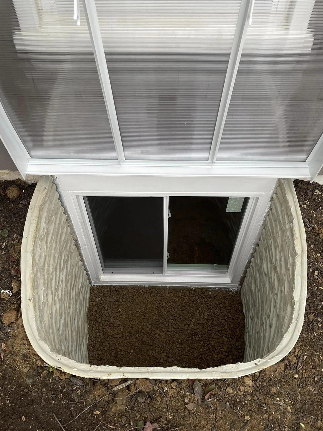 Egress Window Featuring Quarry View Egress Well