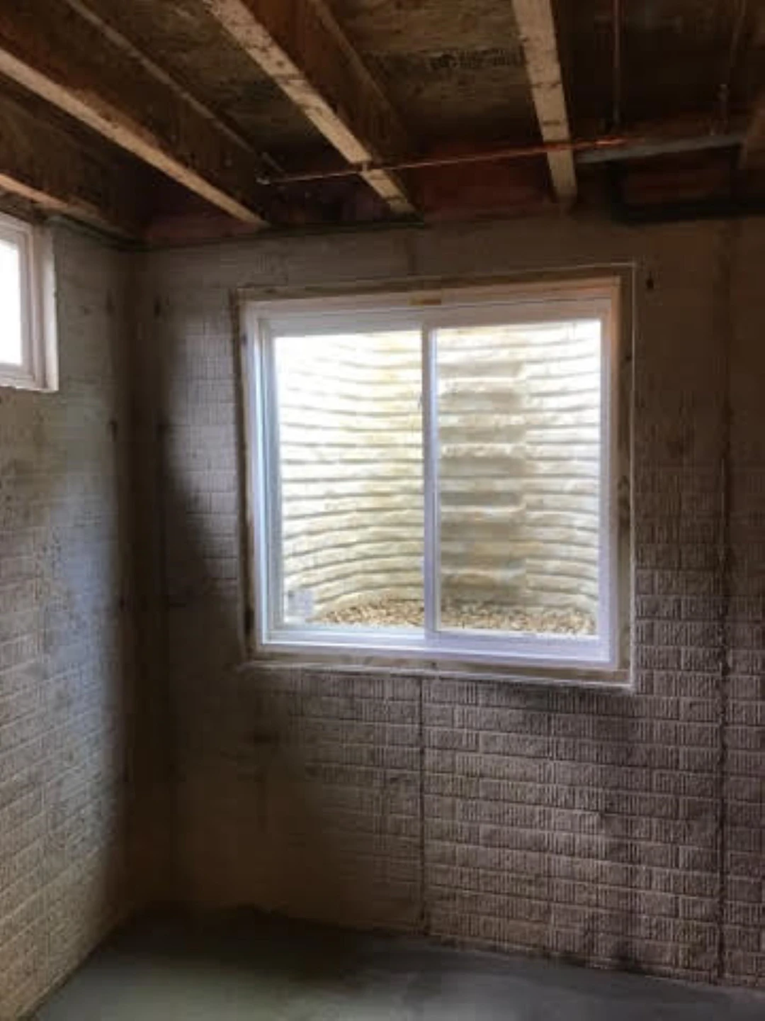 Egress Window Featuring Quarry View Egress Well